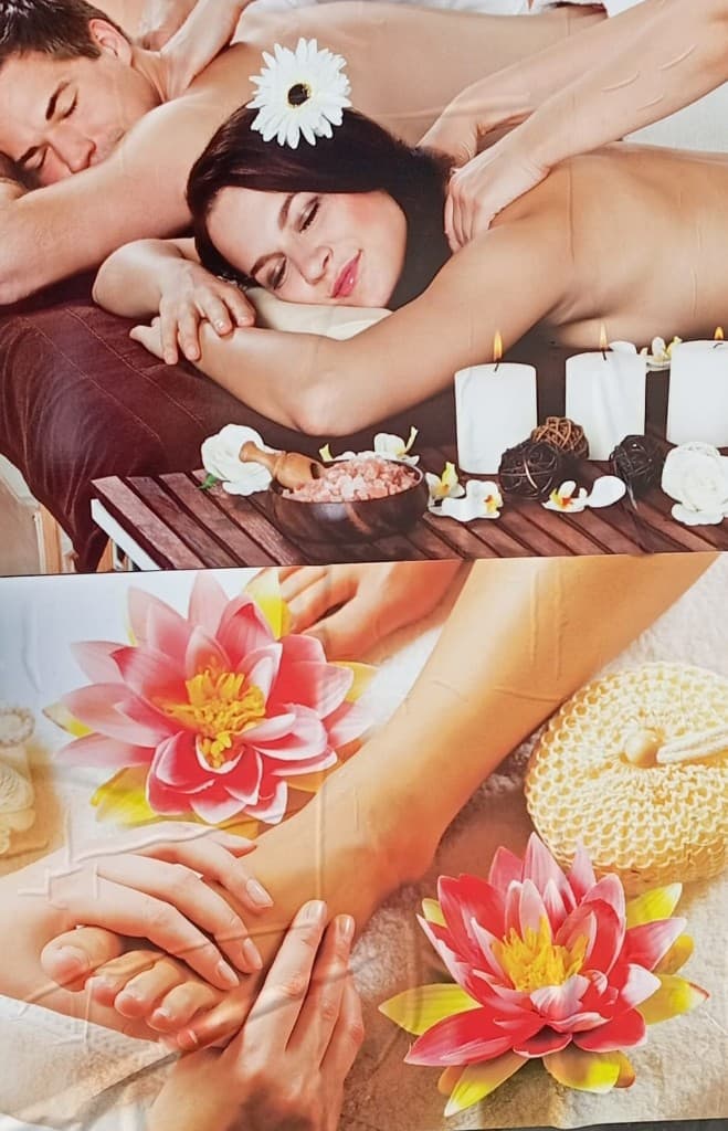 Entspannende Massage mit Kerzen und Spa-Dekoration